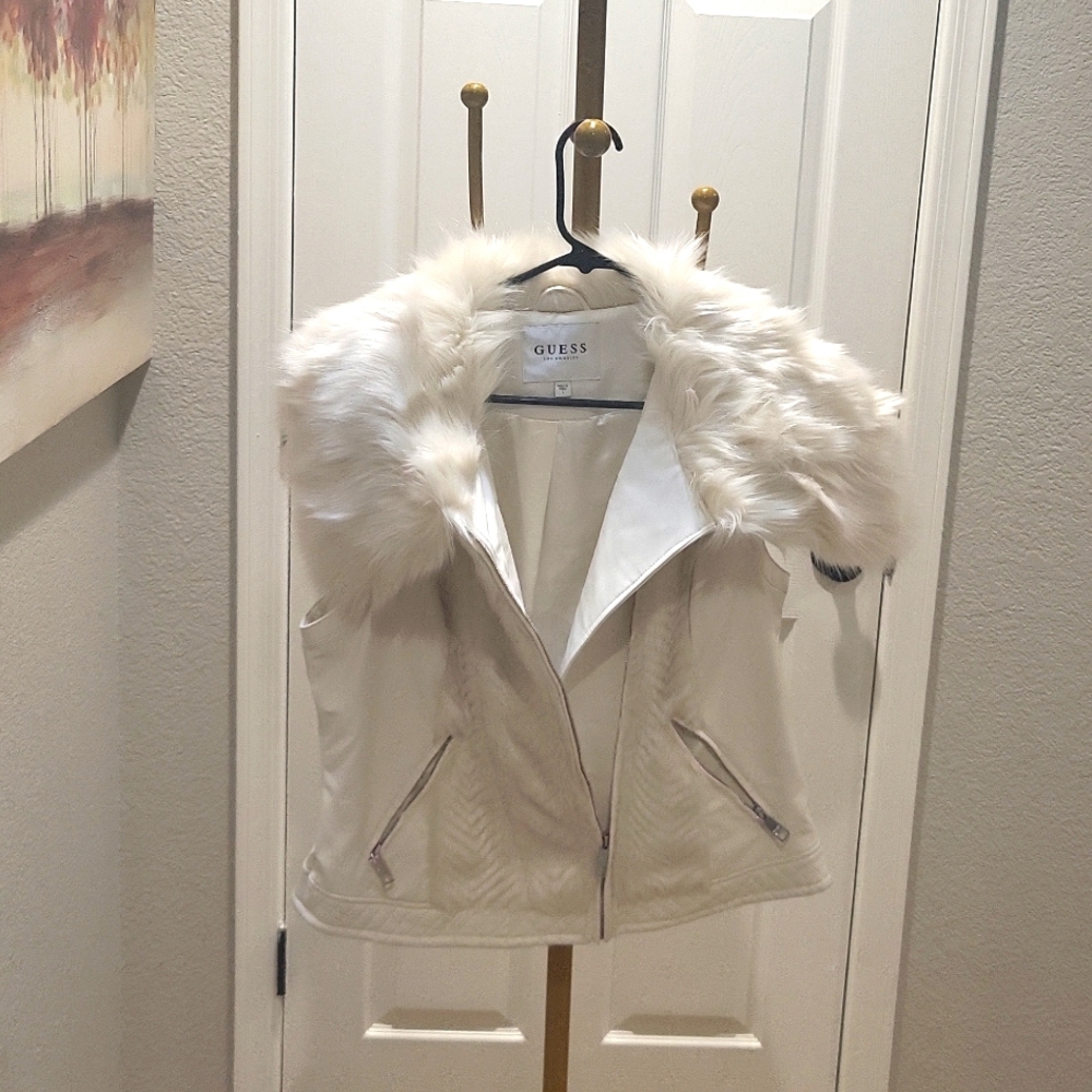 Cream colored  leather uess vest size large with fur.